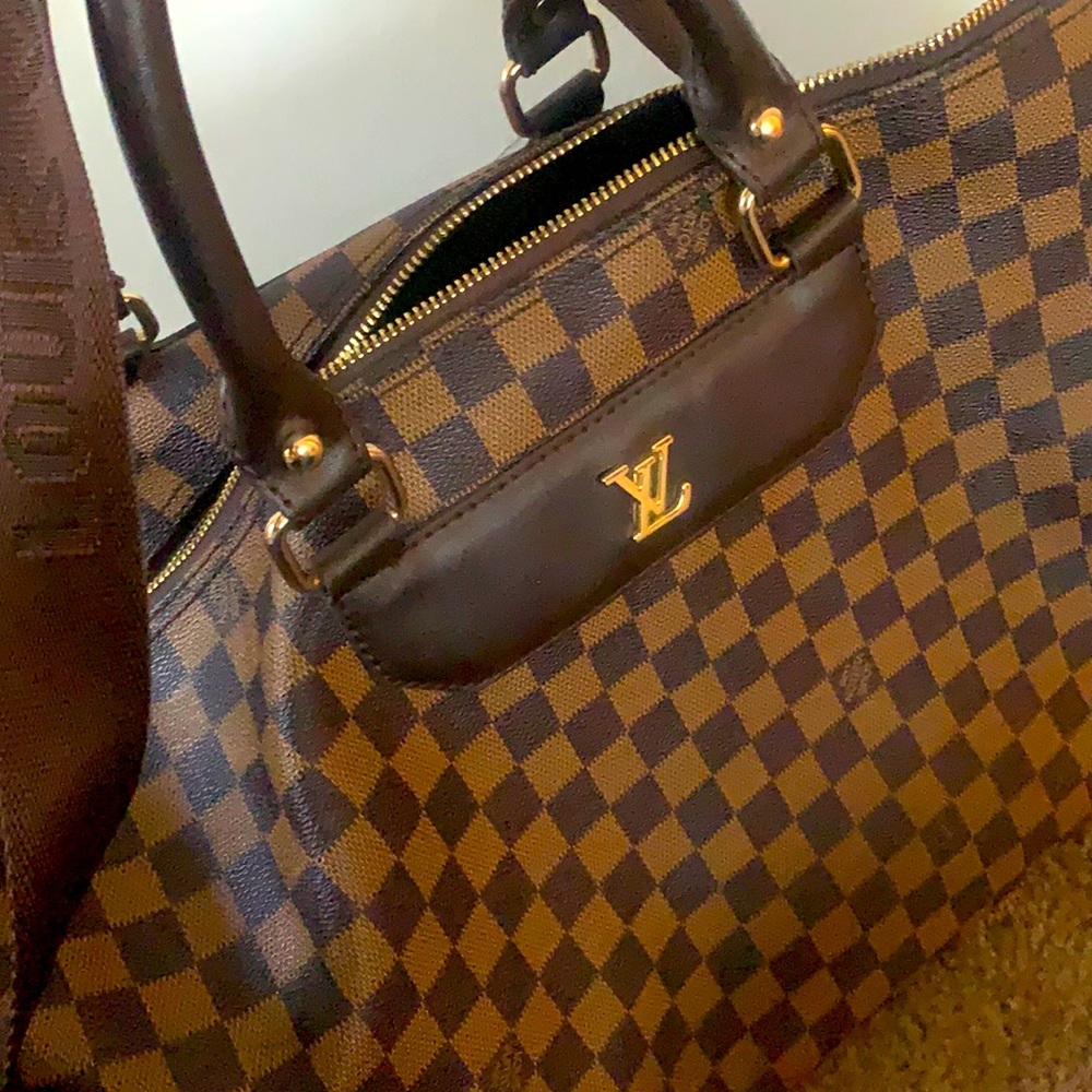 Louis Vuitton Duffle bag